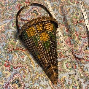 Antique wicker wall pocket